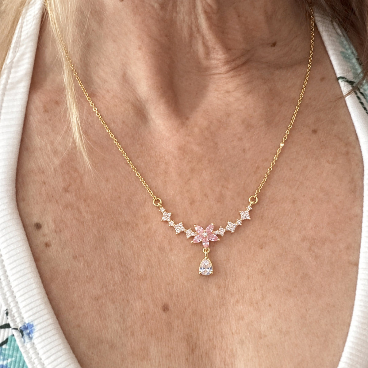 Blush Blossom Teardrop Moissanite Necklace lifestyle photograph